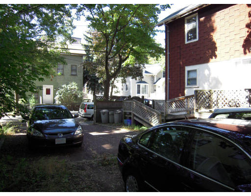 27 Decatur Street Cambridge, MA 02139 - Photo 4 of 4 a couple of cars parked in front of a house