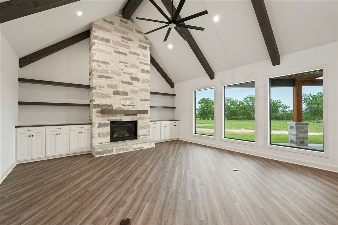 4602 Wesson Drive Bryan, TX 77808 - Photo 14 of 50 Living area with wall of windows, fireplace