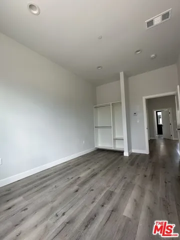 a bathroom with a toilet and a sink