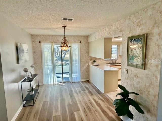10740 Southwest 62nd Avenue Road Ocala, FL 34476 - Photo 4 of 19 a view of a living room and hardwood floor