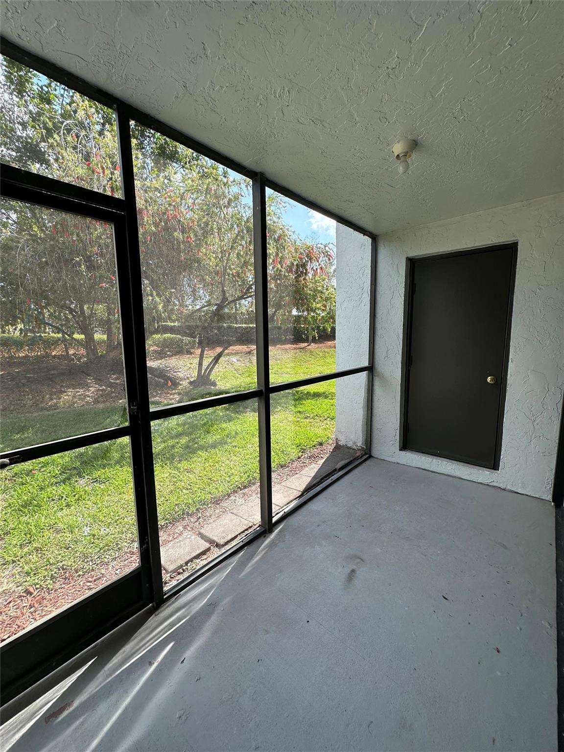 310 Racquet Club Road, Unit 103 Weston, FL 33326 - Photo 8 of 13 PATIO