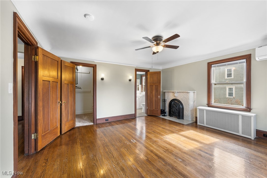 1295 Yellowstone Road Cleveland, OH 44121 - Photo 21 of 45 Bedroom features walk-in closet, decorative fireplace and shares a Jack&Jill Bathroom
