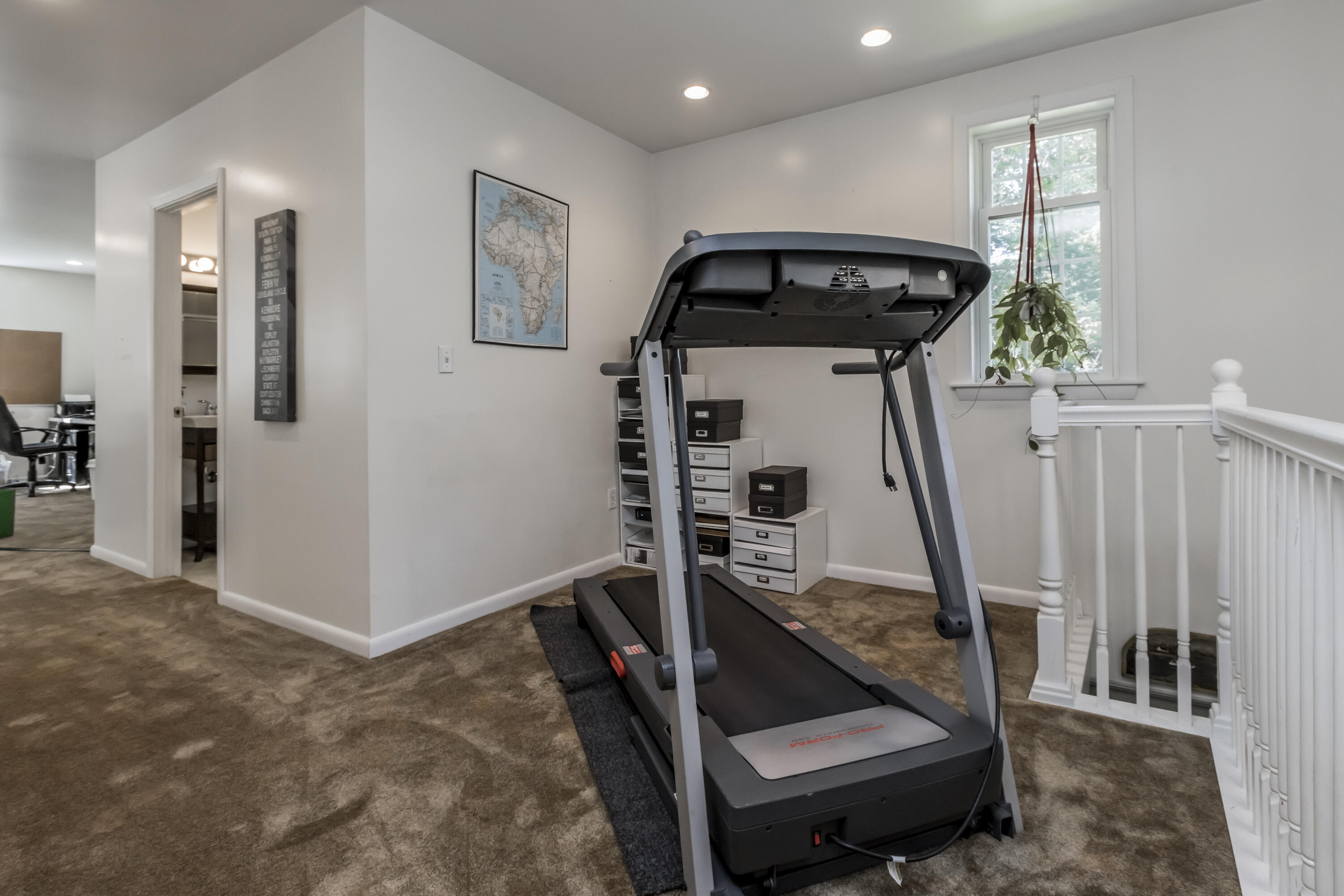 64 Wood Road Cape Elizabeth, ME 04107 - Photo 34 of 41 hallway for desk of work out equipment