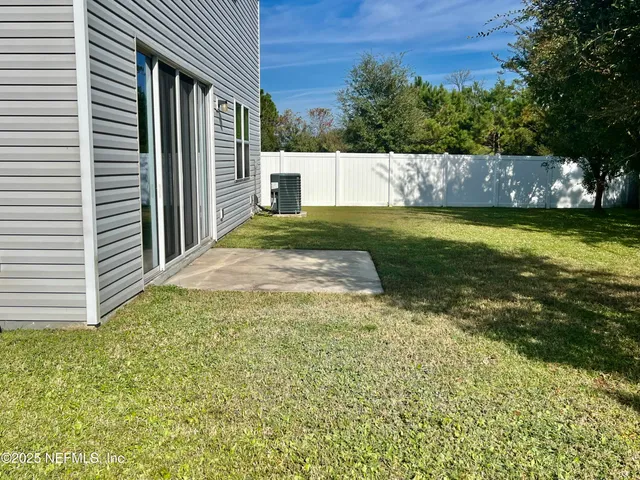 a view of outdoor space and yard