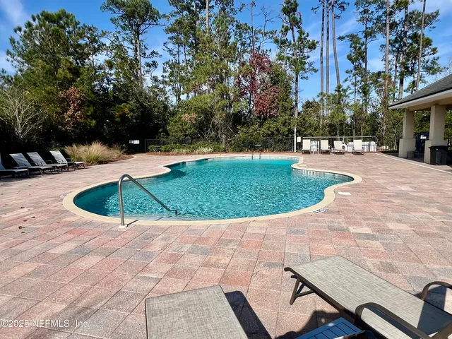 a view of a playground with a patio