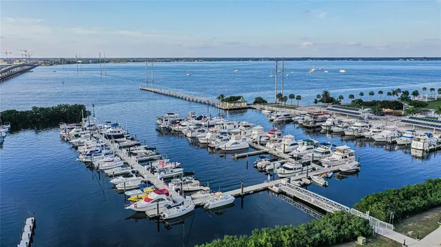an aerial view of a house with a ocean view