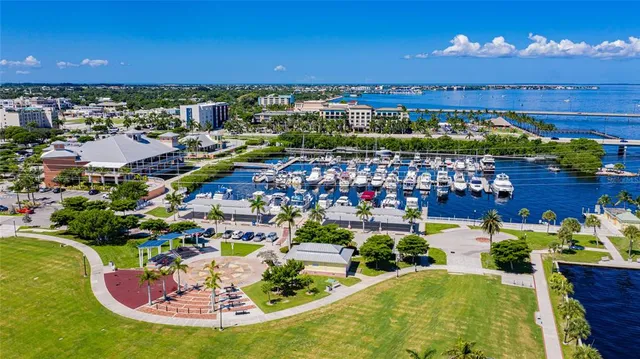 a view of a swimming pool with a table and chairs