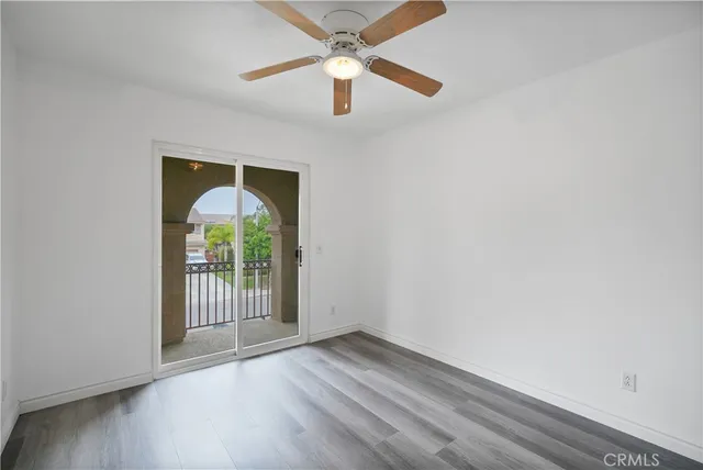 a view of a hallway with windows