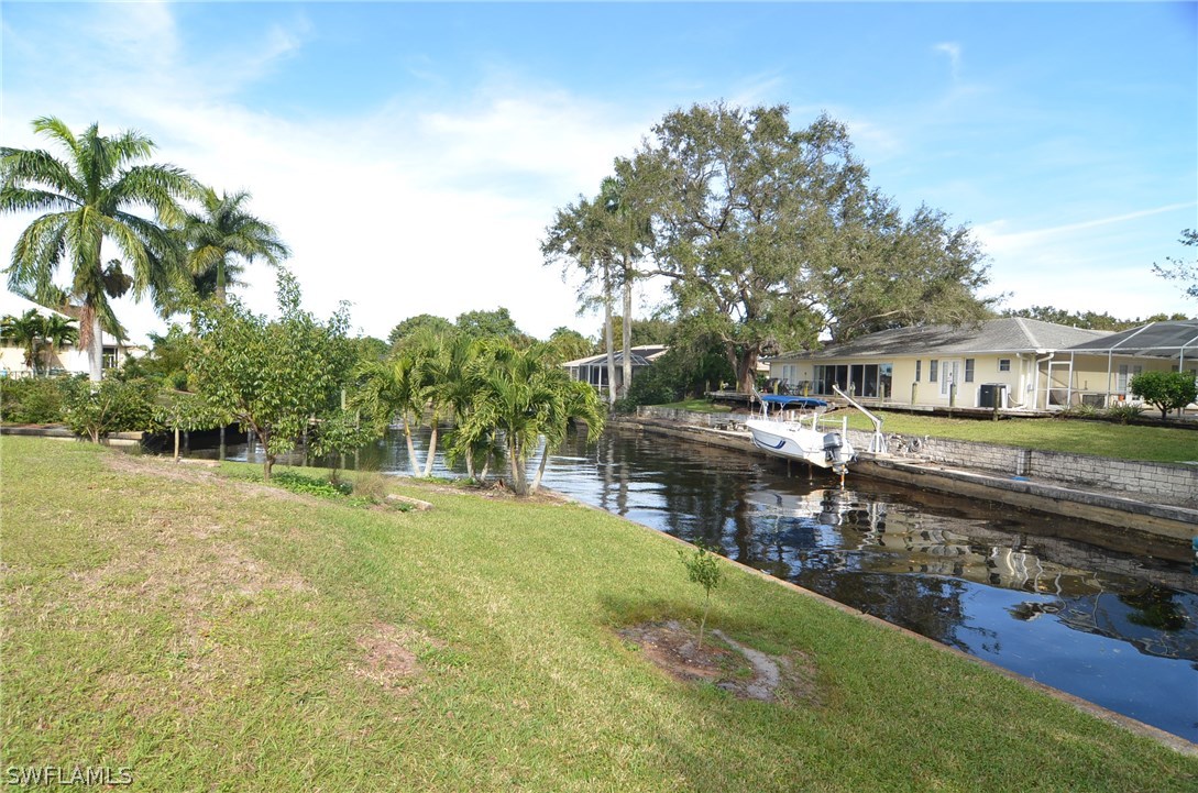 8312 Riviera Avenue Fort Myers, FL 33919 - Photo 23 of 24 a swimming pool view with a outdoor space