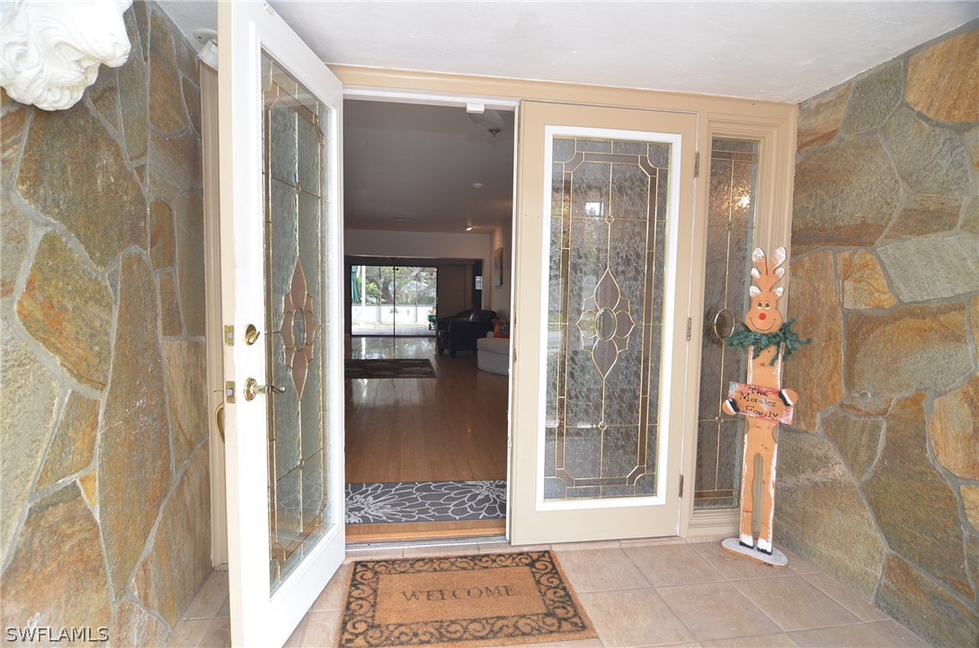 8312 Riviera Avenue Fort Myers, FL 33919 - Photo 5 of 24 a view of a bathroom from a hallway