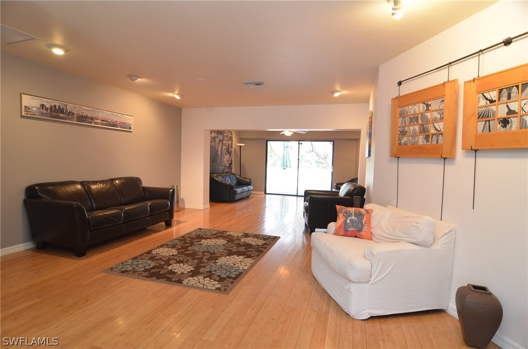 8312 Riviera Avenue Fort Myers, FL 33919 - Photo 7 of 24 a living room with furniture rug and couch