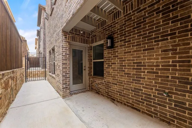 a spacious bathroom with a double vanity sink a large mirror and a bathtub