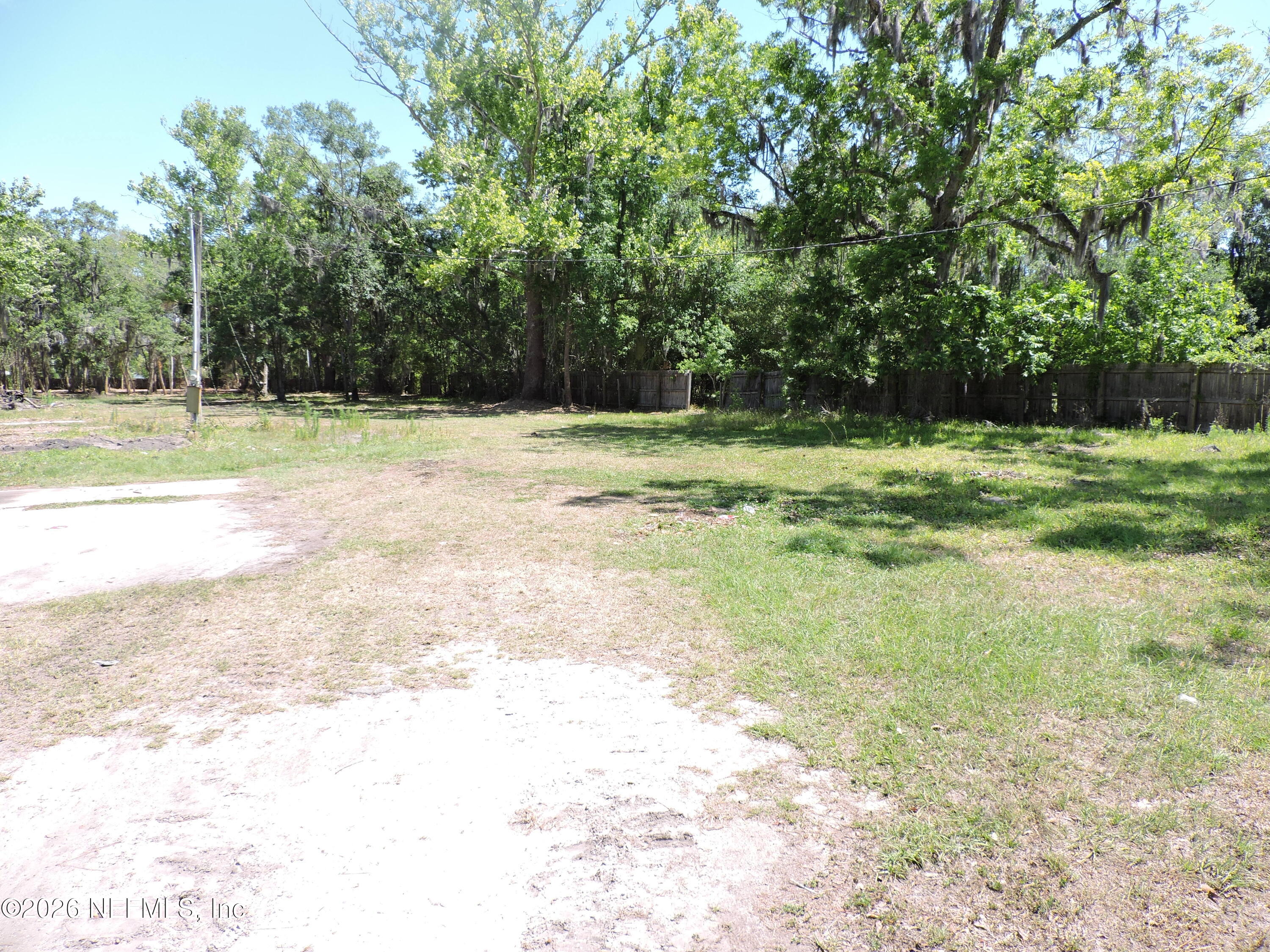 3713 Cedar Point Road Jacksonville, FL 32226 - Photo 11 of 24 a view of a yard
