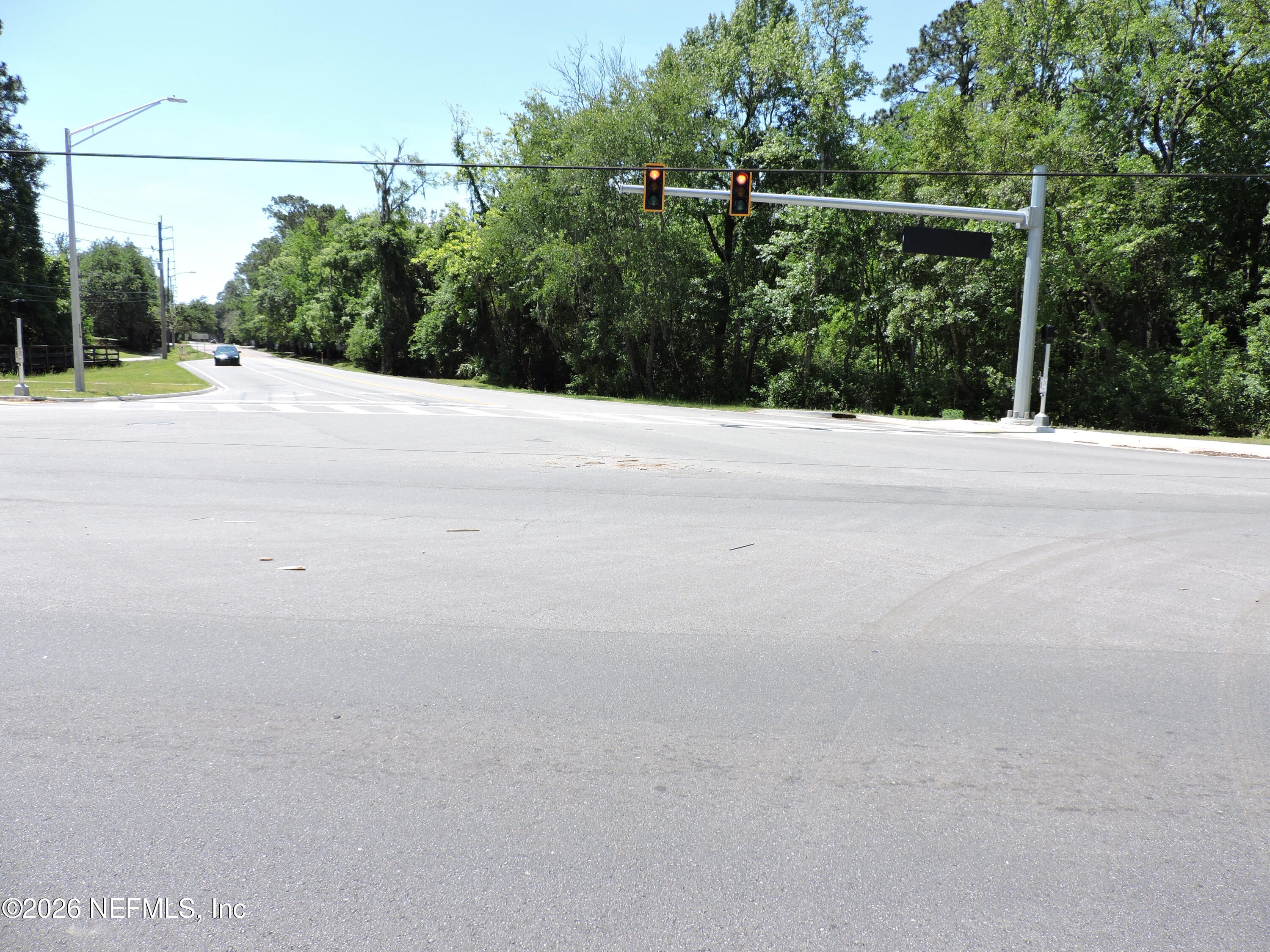 3713 Cedar Point Road Jacksonville, FL 32226 - Photo 6 of 24 a view of a road with a space