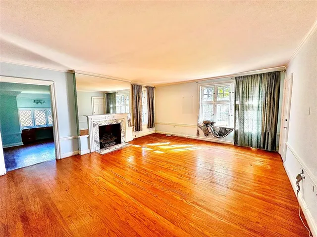 a bathroom with a sink and a large window