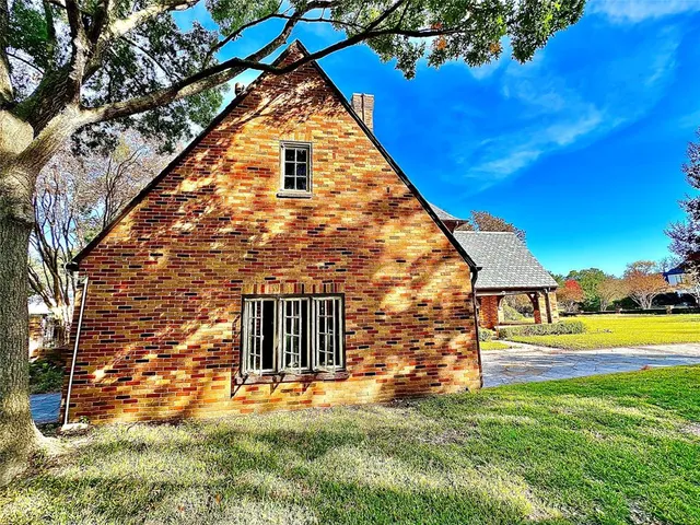 a view of a big yard with an outdoor space