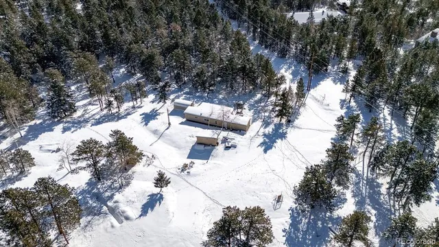 a view of snow on yard