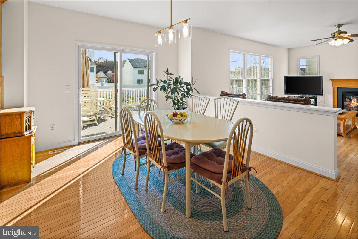 1 Gardengate Court Columbus, NJ 08022 - Photo 14 of 41 a view of a dining room with furniture window and wooden floor