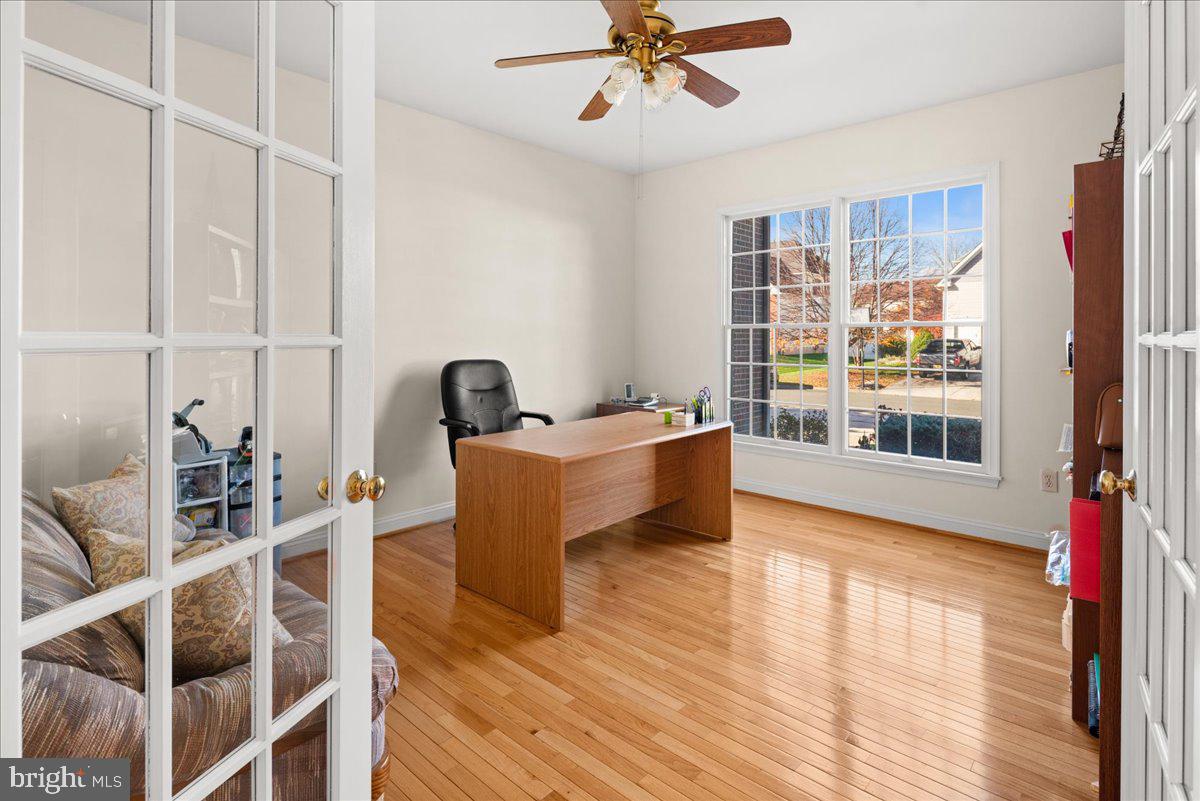 1 Gardengate Court Columbus, NJ 08022 - Photo 3 of 41 a living room with furniture a window and wooden floor
