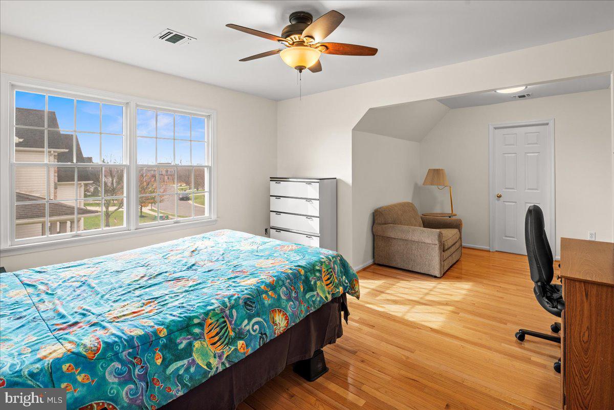 1 Gardengate Court Columbus, NJ 08022 - Photo 31 of 41 a bedroom with a bed desk and a window