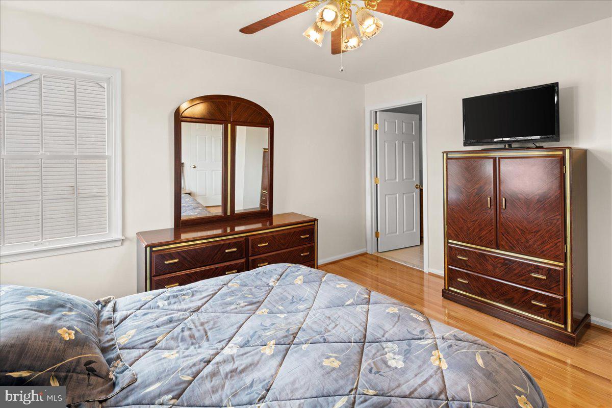 1 Gardengate Court Columbus, NJ 08022 - Photo 34 of 41 a bedroom with a bed and a flat screen tv