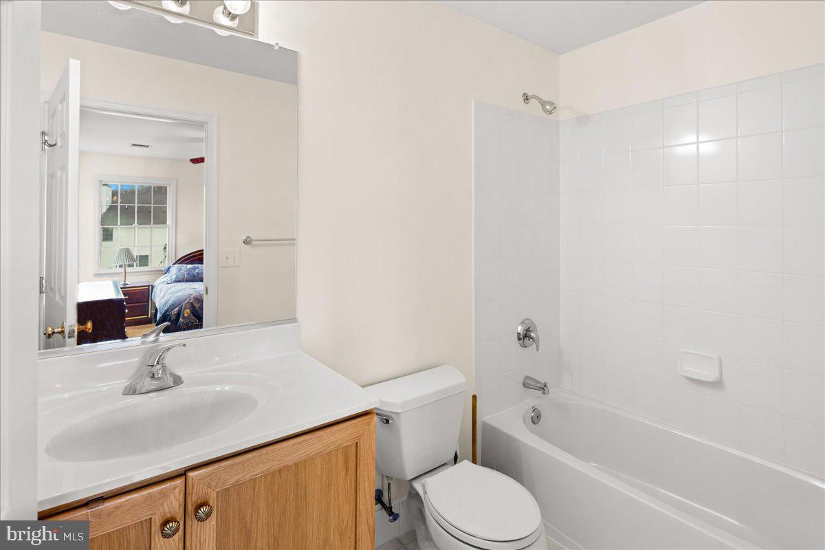 1 Gardengate Court Columbus, NJ 08022 - Photo 35 of 41 a bathroom with a sink toilet vanity and shower