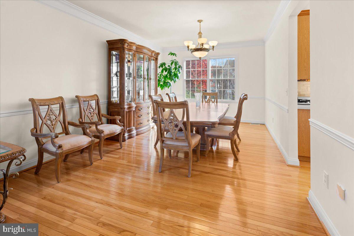 1 Gardengate Court Columbus, NJ 08022 - Photo 7 of 41 a view of a dining room with furniture window and wooden floor
