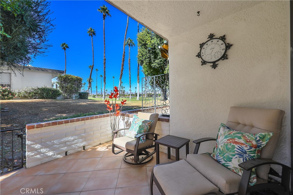 6 Tortosa Drive Rancho Mirage, CA 92270 - Photo 20 of 24 a room with furniture and a potted plant