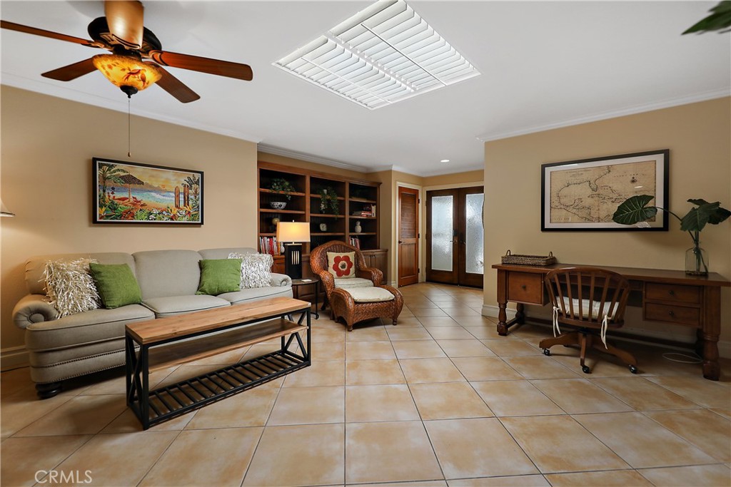 6 Tortosa Drive Rancho Mirage, CA 92270 - Photo 9 of 24 a bedroom with furniture and a chair