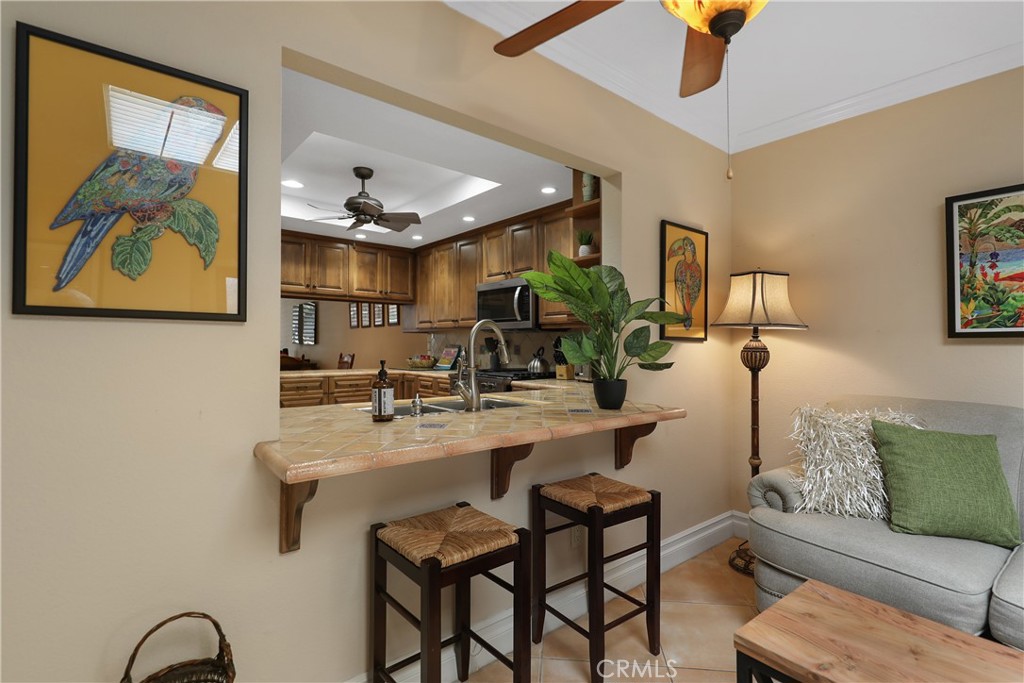 6 Tortosa Drive Rancho Mirage, CA 92270 - Photo 10 of 24 a living room with furniture and painting on the wall