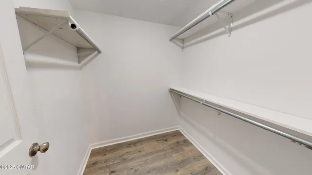 a view of small space with racks on the wall