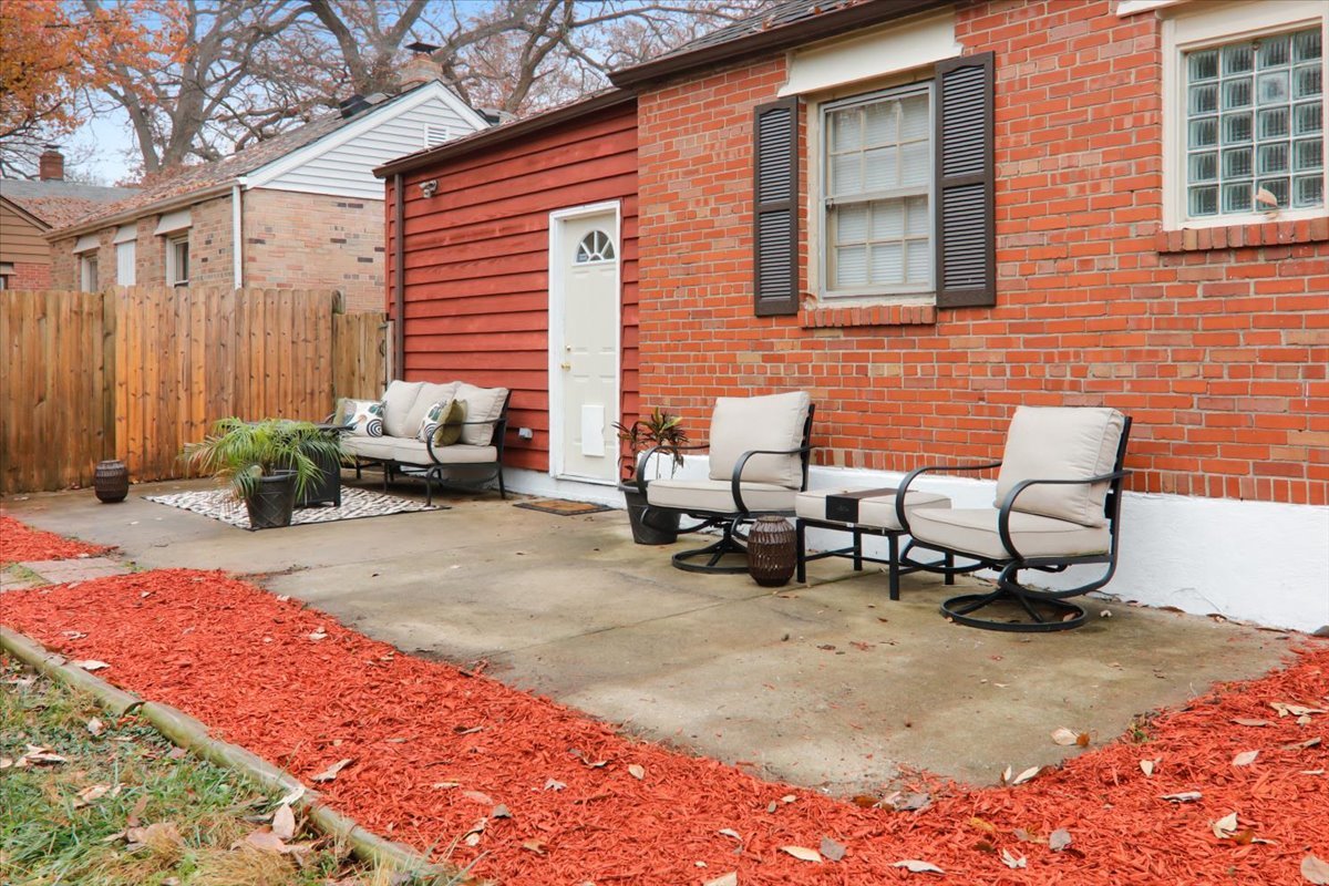 1812 Shady Crest Street Decatur, IL 62521 - Photo 16 of 16 a couple of chairs sitting in front of a house