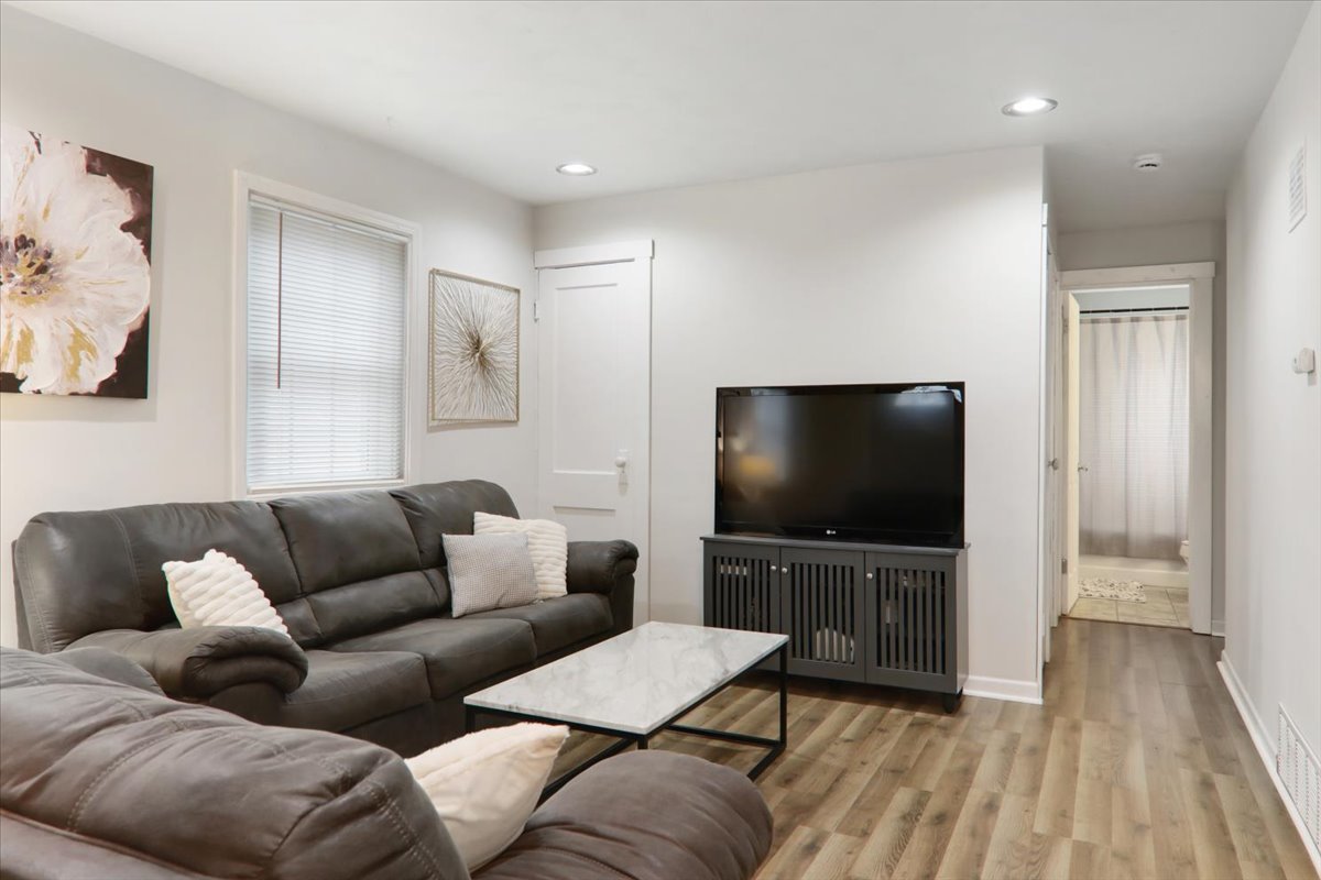 1812 Shady Crest Street Decatur, IL 62521 - Photo 3 of 16 a living room with furniture and a flat screen tv