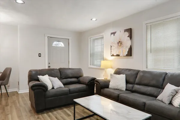a living room with furniture and a couch