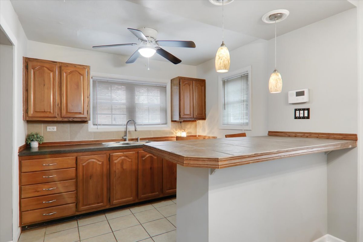 1812 Shady Crest Street Decatur, IL 62521 - Photo 6 of 16 a kitchen with a sink and a cabinets