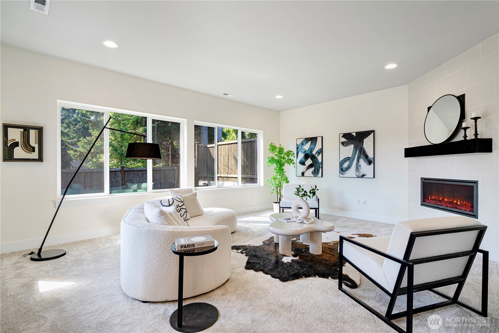1130 199th Street Southeast Bothell, WA 98012 - Photo 13 of 33 a living room with furniture a window and a potted plant