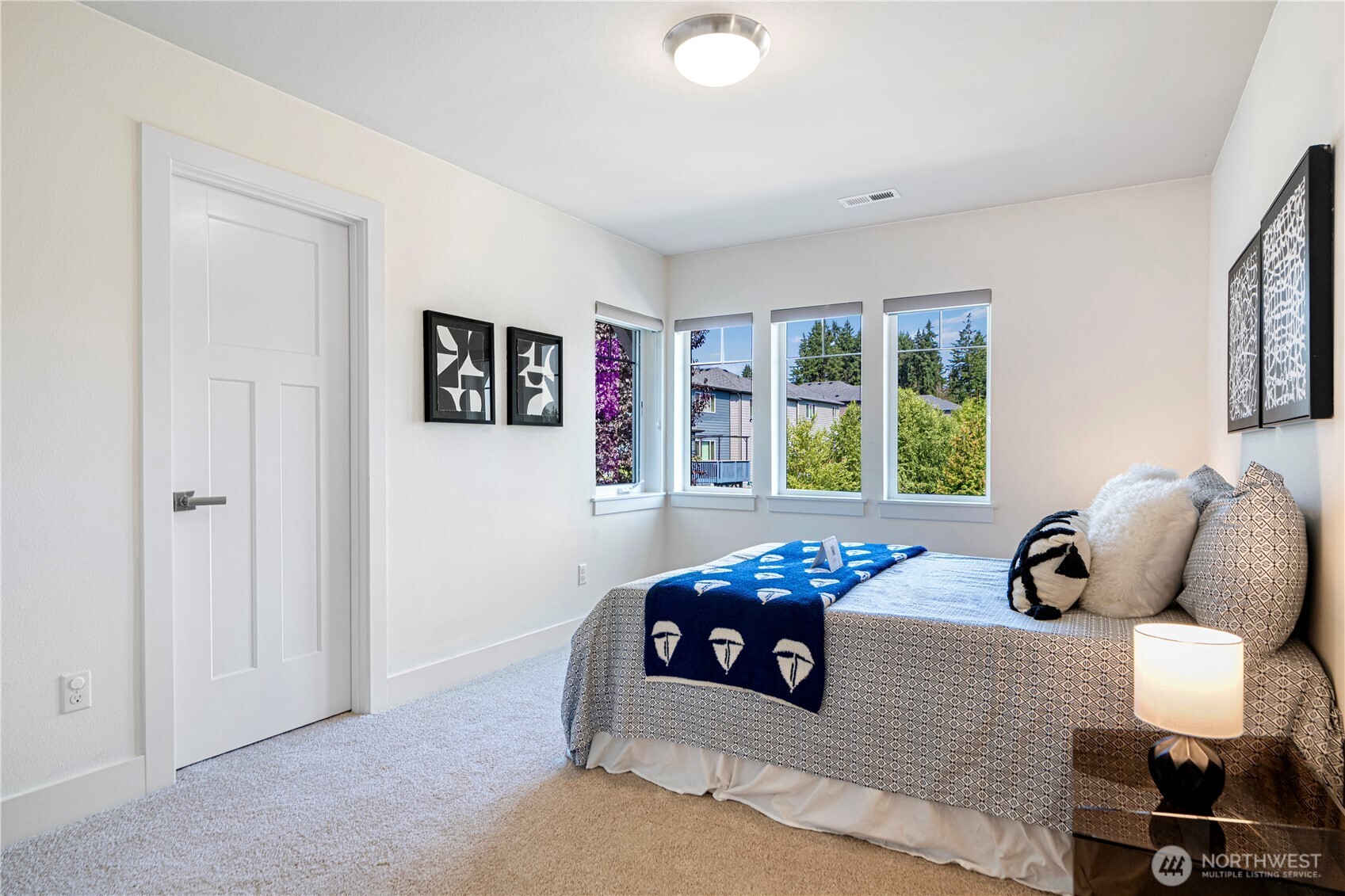 1130 199th Street Southeast Bothell, WA 98012 - Photo 16 of 33 a bedroom with furniture and a large window