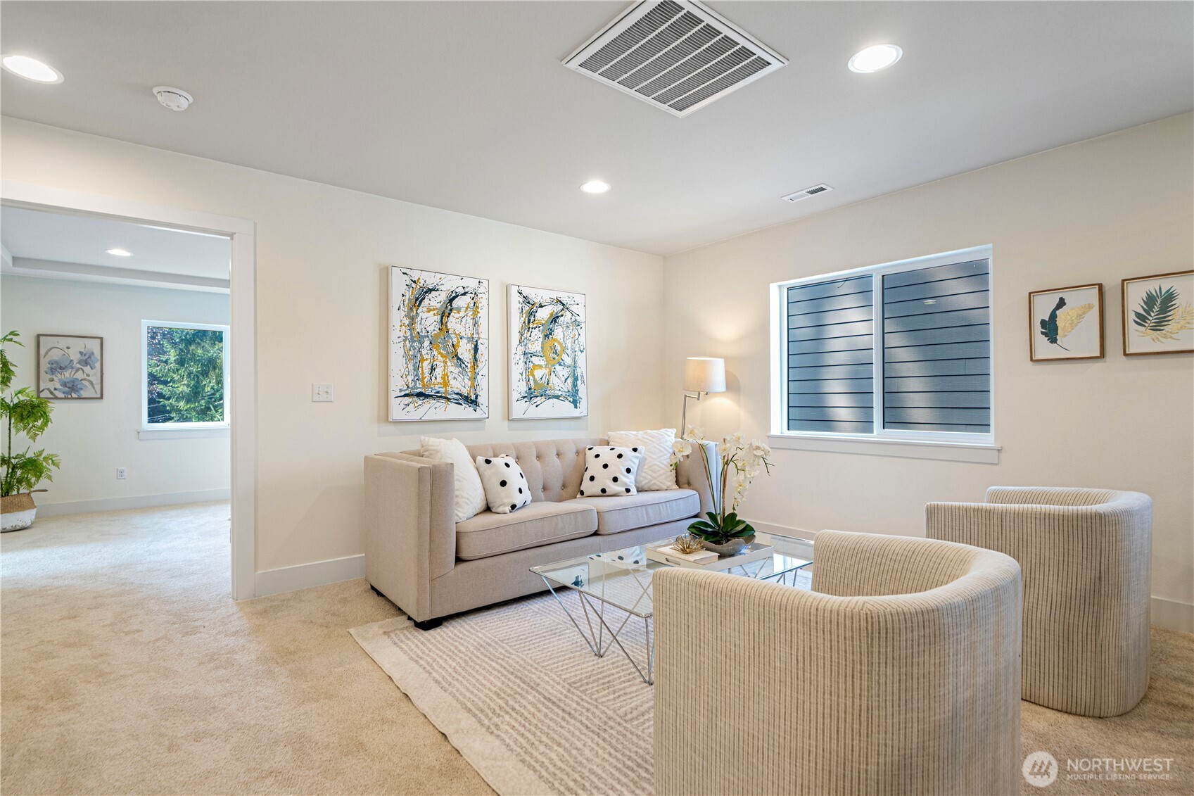 1130 199th Street Southeast Bothell, WA 98012 - Photo 27 of 33 a living room with furniture and a window
