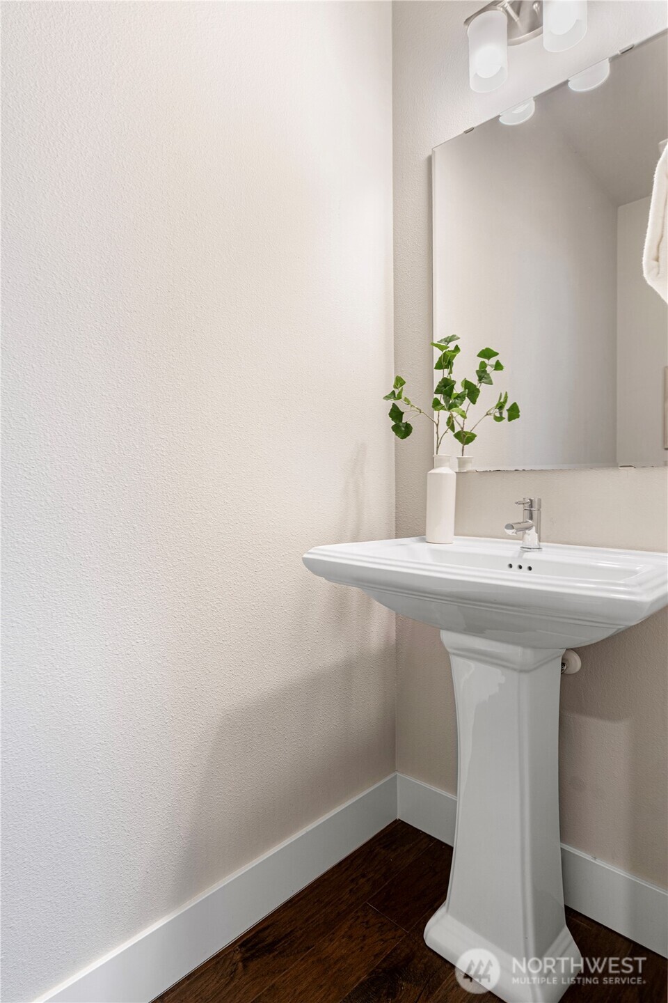 1130 199th Street Southeast Bothell, WA 98012 - Photo 3 of 33 a bathroom with a sink and a mirror