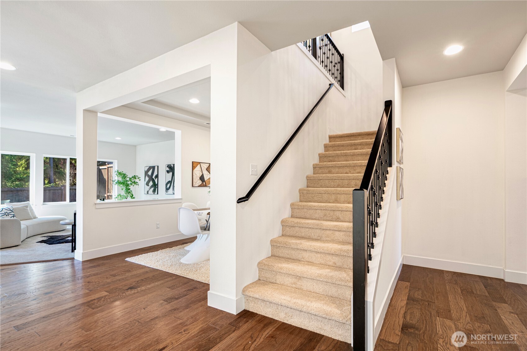 1130 199th Street Southeast Bothell, WA 98012 - Photo 6 of 33 a view of entryway and hall with wooden floor