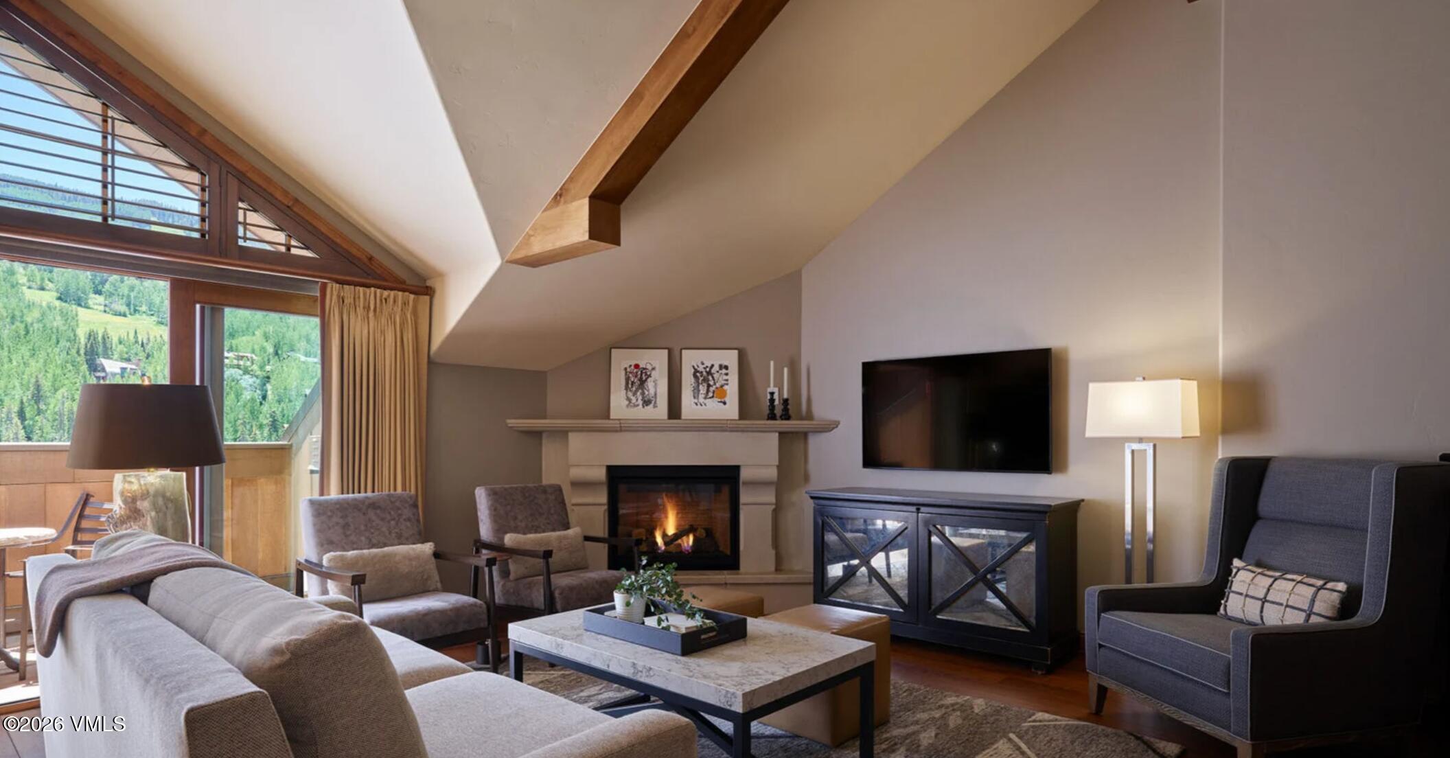 16 Vail Road, Unit 504 Vail, CO 81657 - Photo 3 of 12 Sebastian Club Residence living fireplac