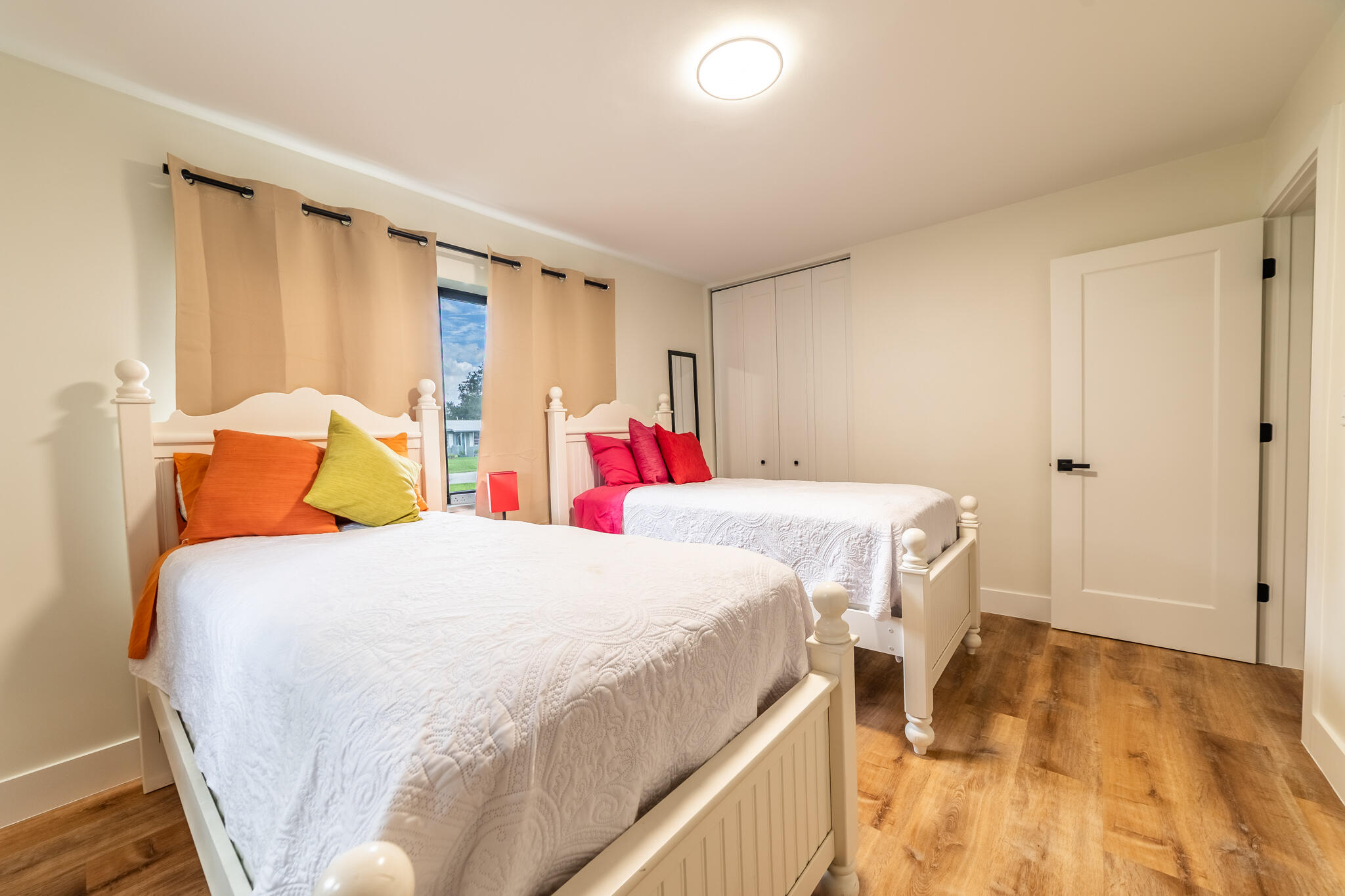 809 Southeast 12th Street Okeechobee, FL 34974 - Photo 19 of 62 a bedroom with a bed and a window