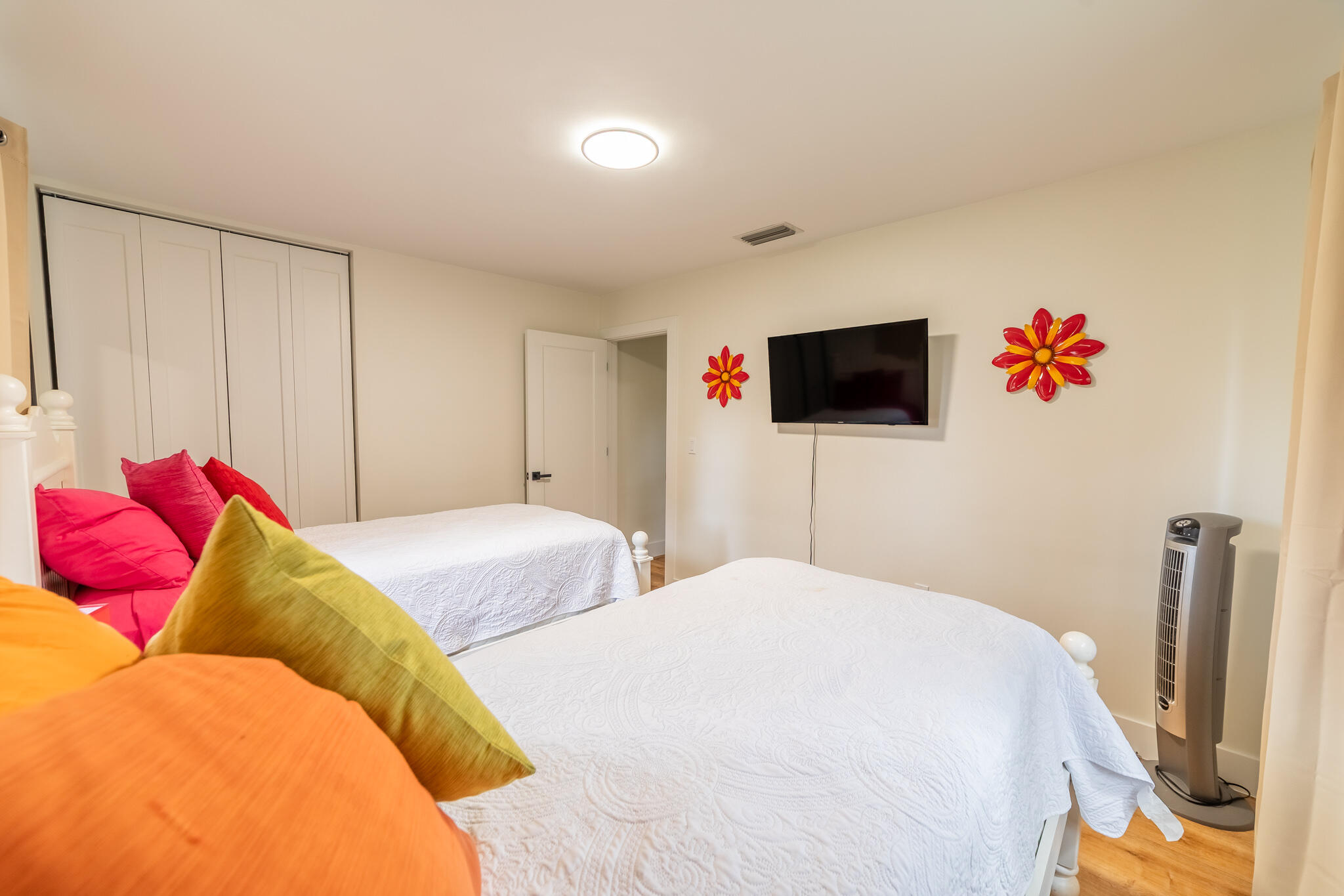 809 Southeast 12th Street Okeechobee, FL 34974 - Photo 20 of 62 a bedroom with a bed and a flat screen tv