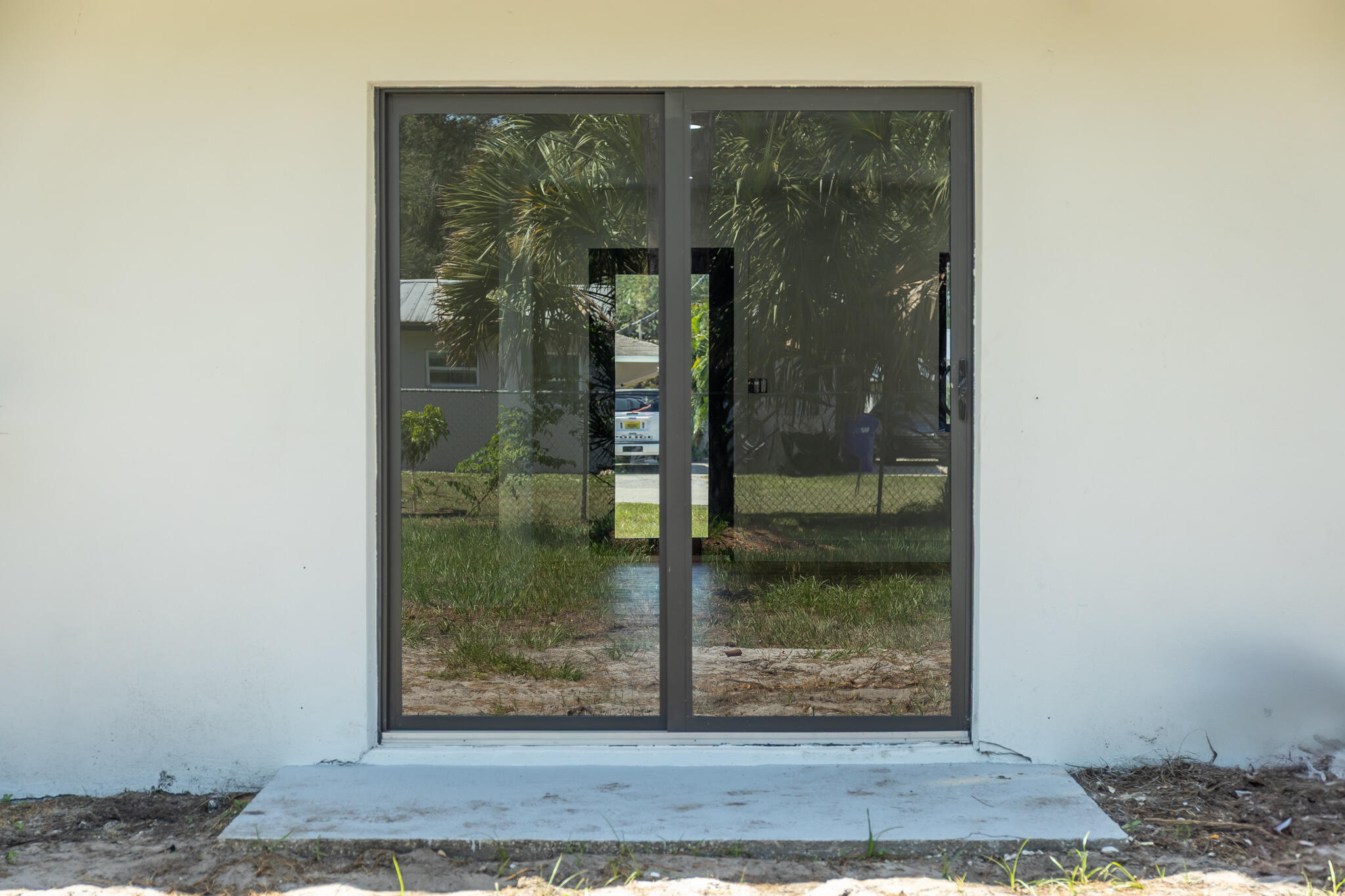 809 Southeast 12th Street Okeechobee, FL 34974 - Photo 33 of 62 a view of a glass door