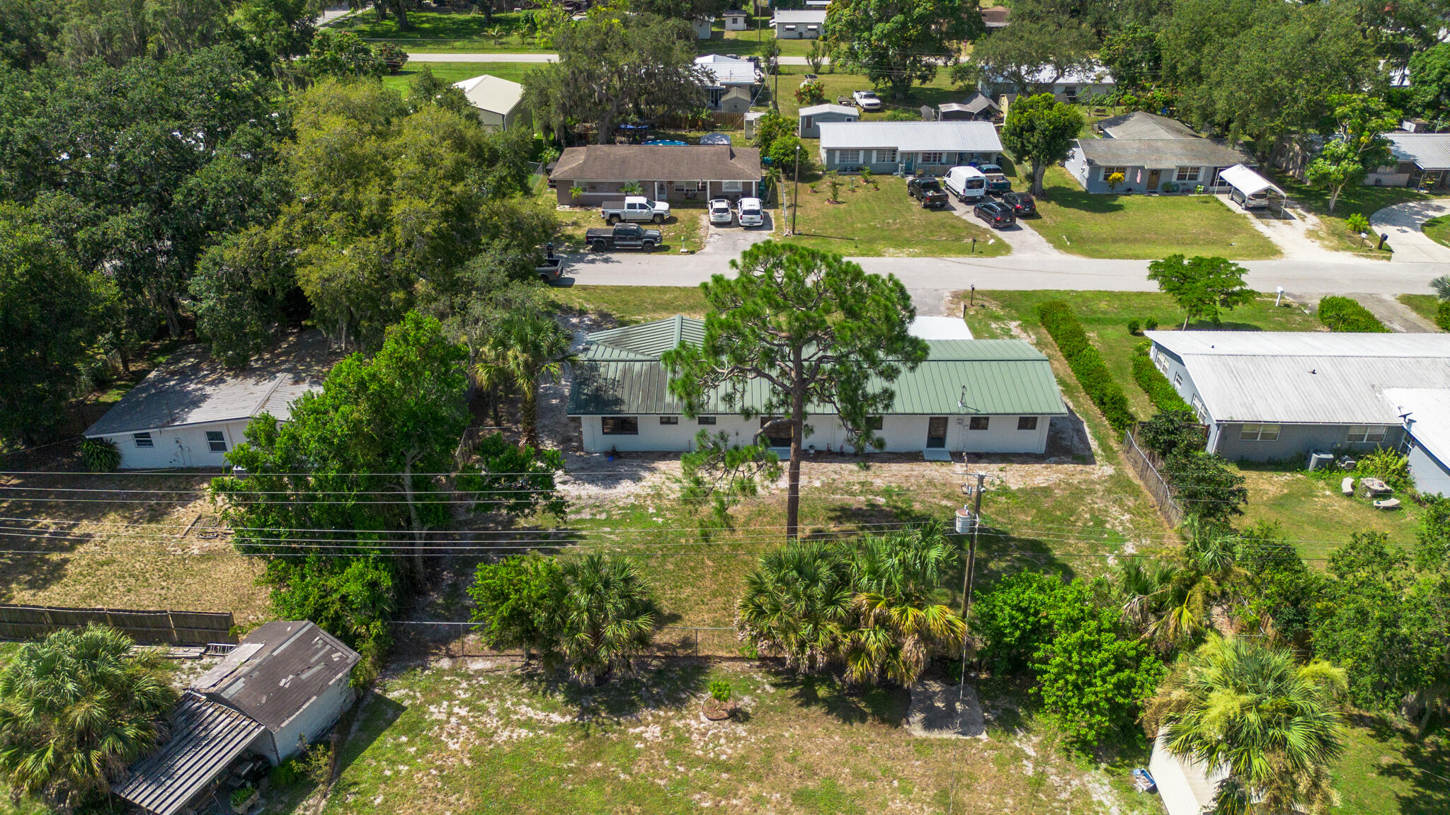809 Southeast 12th Street Okeechobee, FL 34974 - Photo 50 of 62 an aerial view of a house with yard swimming pool and outdoor seating