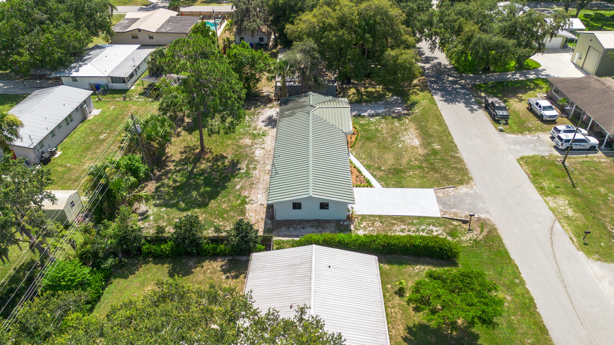 809 Southeast 12th Street Okeechobee, FL 34974 - Photo 51 of 62 an aerial view of a house with a garden