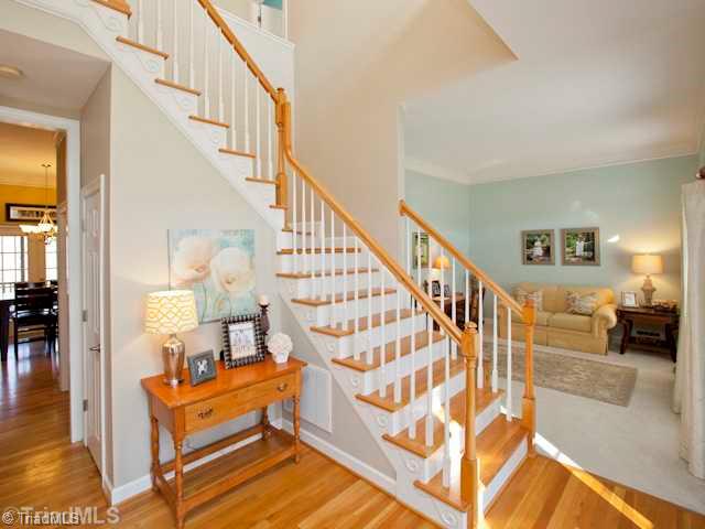 7839 Wilson Farm Road Summerfield, NC 27358 - Photo 2 of 16 Entry. Welcome home, beautiful hardwood floors and 10 ceilings on the main level, offering a wonderful spacious feeling.