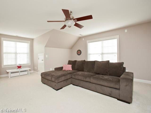 7839 Wilson Farm Road Summerfield, NC 27358 - Photo 12 of 16 Bonus. Spacious Bonus room, large walk in closet. The second staircase comes up to the area from the back hall kitchen area.