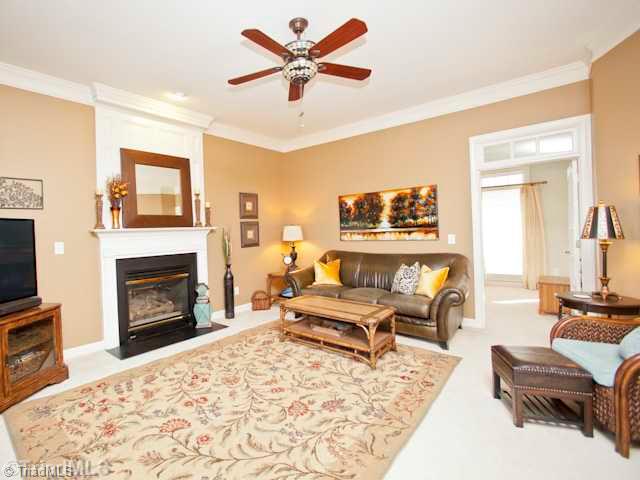 7839 Wilson Farm Road Summerfield, NC 27358 - Photo 7 of 16 Den/Family/Great Room. Spacious Den area with gas log fireplace which flows from the Kitchen and Living room area.