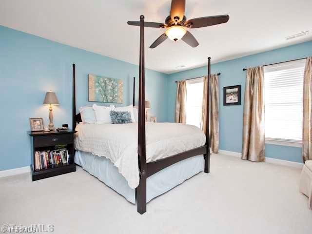 7839 Wilson Farm Road Summerfield, NC 27358 - Photo 8 of 16 Master Bedroom. Upper spacious master bedroom suite, large walkin closet and spa.